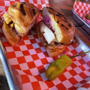 Aura Cinema - This chicken sandwich it's hella good - Cocktail Bars Near Me - San Francisco, California