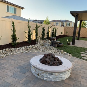 Rafael's Landscape - a patio with a fire pit - Landscaping Near Me - Rialto, California
