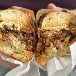 Bao Boss - Birria Baguette. The absolute best sandwich I have EVER had. Do not miss any opportunity to try this!