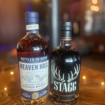 The Usual Place - two bottles of liquor on a table - Lounges Near Me - Las Vegas, Nevada The Usual Place - two bottles of liquor on a table - Lounges Near Me - Las Vegas, Nevada