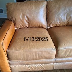 La-Z-Boy Home Furnishings & Decor - Mismatched leather-Sun bleached blah and mystery orange.