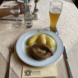 Restaurant Glocke - Brätwurst with sauerkraut and potatoes. Hefeweizen beer.   out of five. About €15.