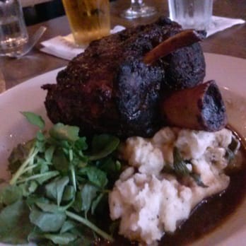 Max's Trumbull Kitchen - Crackling Pork Shank / crimini mushroom whipped potatoes, three chile braise, watercress $19 - New American Near Me - Hartford, Connecticut
