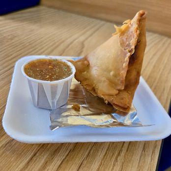 Medi's Mediterranean Fusion - Samosa with side sauce - Indian Near Me - Macon, Georgia Medi's Mediterranean Fusion - Samosa with side sauce - Indian Near Me - Macon, Georgia