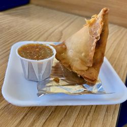 Medi's Mediterranean Fusion - Samosa with side sauce