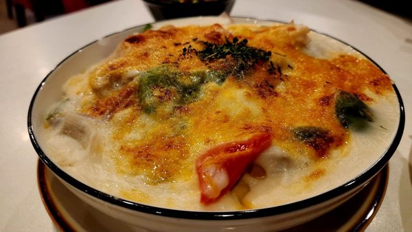 Photo of Shooting Star Cafe - Oakland, CA, US. Baked seafood over rice