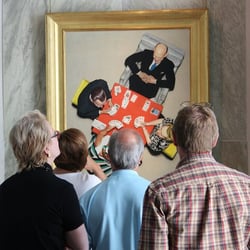 National Museum of American Illustration - Visitors observe Rockwell's talent in his Saturday Evening Post cover, 'The Bridge Game'