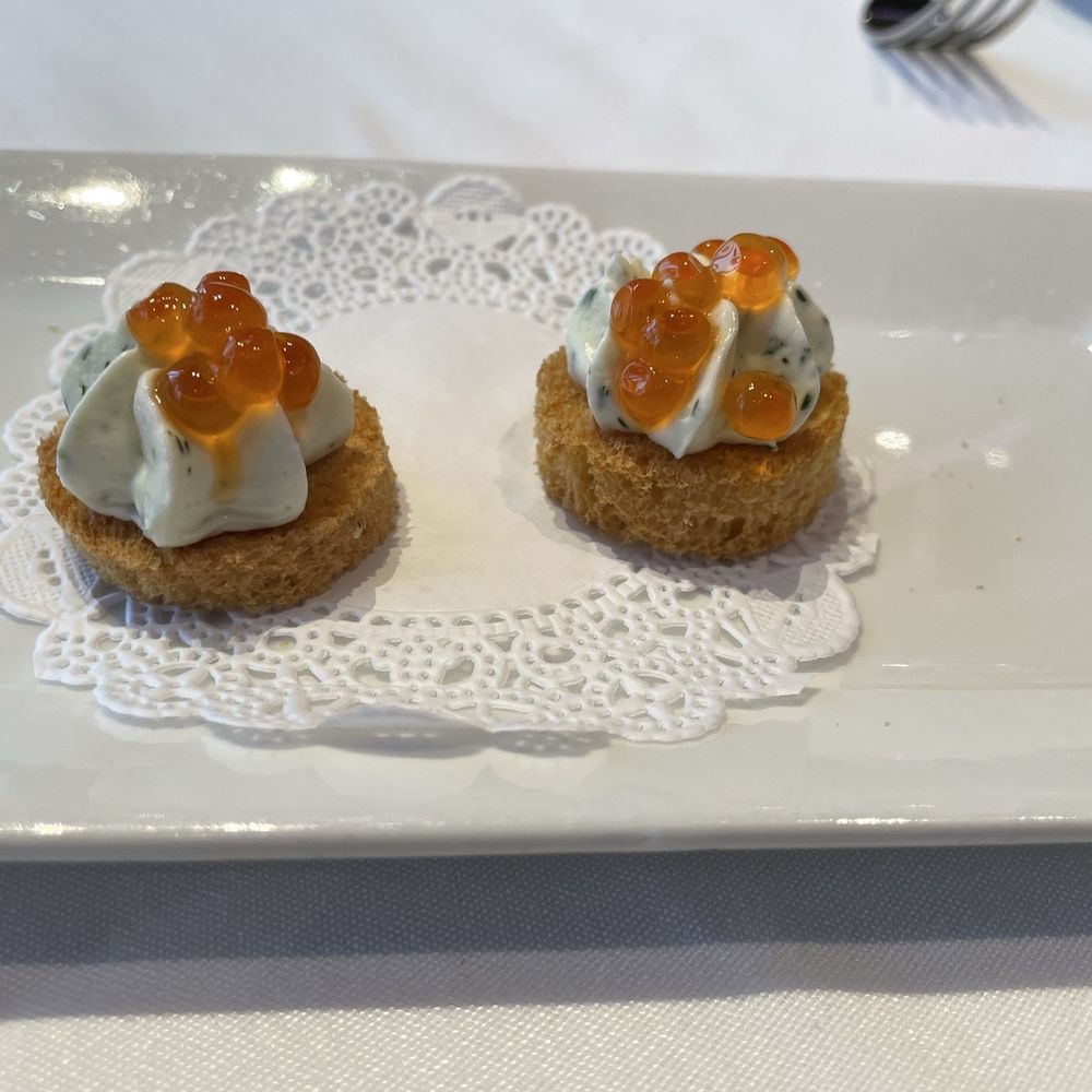 Robert - amuse-bouche of caviar, crème and flatbread - New American Near Me - New York, New York Robert - amuse-bouche of caviar, crème and flatbread - New American Near Me - New York, New York