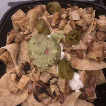 El Pollo Loco - The new double fire roasted chicken nachos. Not what the picture in the ad looks like. Where's the cheese? - Fast Food Near Me - Van Nuys, California El Pollo Loco - The new double fire roasted chicken nachos. Not what the picture in the ad looks like. Where's the cheese? - Fast Food Near Me - Van Nuys, California