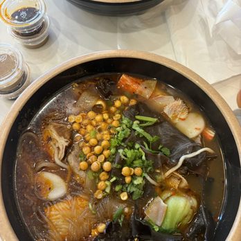 Tang Bar - Hot and sour soup base with lots of mixed hot pot items - Hot Pot Near Me - San Mateo, California Tang Bar - Hot and sour soup base with lots of mixed hot pot items - Hot Pot Near Me - San Mateo, California