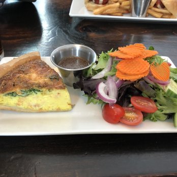 Peter Christian's Tavern - salmon spinach quiche with salad - American Near Me - New London, New Hampshire Peter Christian's Tavern - salmon spinach quiche with salad - American Near Me - New London, New Hampshire