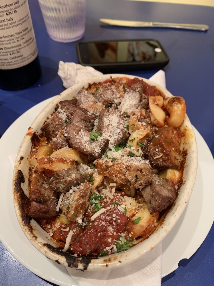 Order Tortellini Pomodoro food online from Reginelli's Pizzeria store, New Orleans on bringmethat.com