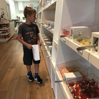 ZaZoLi Sweets - a young boy in a store - Candy Stores Near Me - Richmond, Virginia