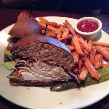 The Chop House - Turkey sandwich on lunch menu with sweet potato fries and a pickle - Steakhouses Near Me - Sevierville, Tennessee The Chop House - Turkey sandwich on lunch menu with sweet potato fries and a pickle - Steakhouses Near Me - Sevierville, Tennessee
