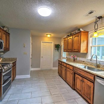 Royal Renovations - New tile flooring - Fences & Gates Near Me