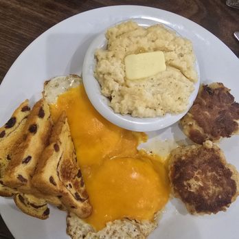 The Smoking Egg - Crab cakes, eggs, grits with butter, cheese, and raising toast. - Seafood Near Me - Savannah, Georgia