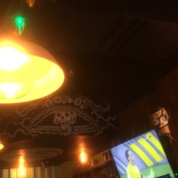 Broken English Taco Pub - The Loop - Catrina=Day of the Dead Mexican style artwork in background - Mexican Near Me - Chicago, Illinois Broken English Taco Pub - The Loop - Catrina=Day of the Dead Mexican style artwork in background - Mexican Near Me - Chicago, Illinois