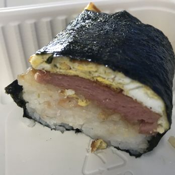 Top Restaurant - Spam and egg musubi (half, cross section) - Indonesian Near Me - Pasadena, California Top Restaurant - Spam and egg musubi (half, cross section) - Indonesian Near Me - Pasadena, California