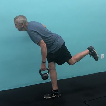 Primal Strength and Conditioning - John working hard on KB single leg Romanian deadlifts to improve balance, stability, core and leg strength, co-ordination and hip hinge. - Trainers Near Me - Lakeland, Florida