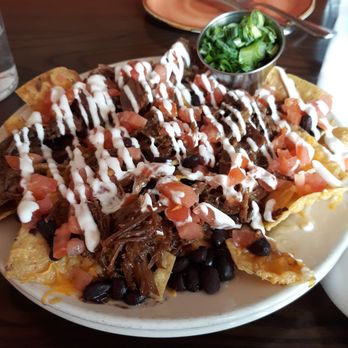 Maya Del Sol - Mango-braised beef nachos. Yum! - Latin American Near Me - Oak Park, Illinois