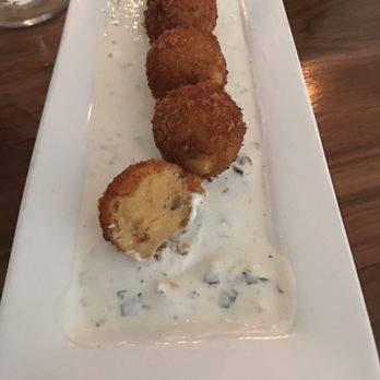 Malt - Potato croquettes with cheddar and a homemade ranch dressing. - New American Near Me - Newport, Rhode Island Malt - Potato croquettes with cheddar and a homemade ranch dressing. - New American Near Me - Newport, Rhode Island