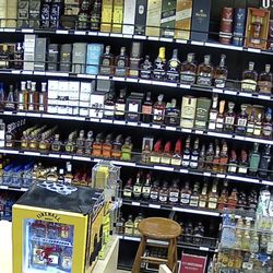 Liquor Center - The liquor wall only represents 1/4th of the vast wine and spirit collection at Liquor Center