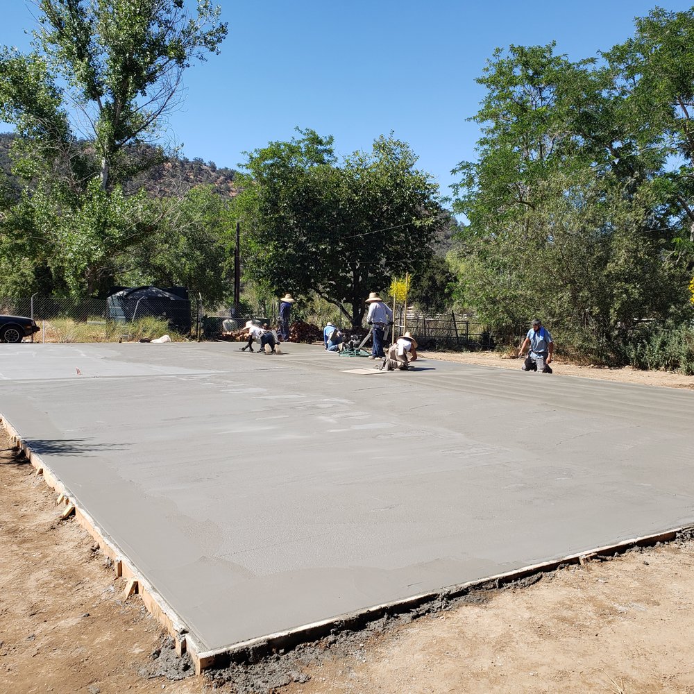 Borjas Gardening - a group of people working on a concrete slab - Landscaping Near Me Borjas Gardening - a group of people working on a concrete slab - Landscaping Near Me