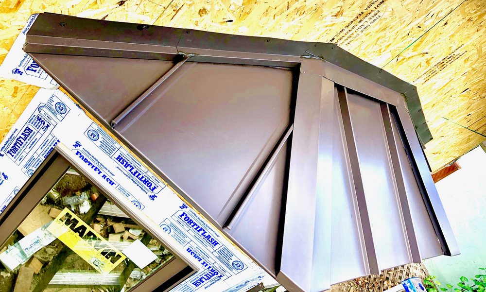 Slide of Economy Roofing