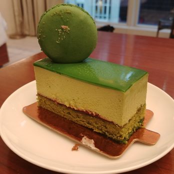 Bibble & Sip - Pistachio Cake w/ Matcha White Chocolate Mousse & Raspberry Gelee - Coffee & Tea Near Me - New York, New York Bibble & Sip - Pistachio Cake w/ Matcha White Chocolate Mousse & Raspberry Gelee - Coffee & Tea Near Me - New York, New York