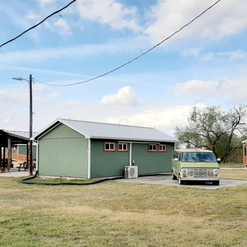 The Gas Station - Rental bungalows/cabins behind Gas Station. Green Ford van was in 1974 TCM movie. - Barbeque Near Me - Bastrop, Texas The Gas Station - Rental bungalows/cabins behind Gas Station. Green Ford van was in 1974 TCM movie. - Barbeque Near Me - Bastrop, Texas
