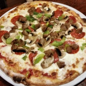Arsenal City Tavern - Mess Dress Pizza (pepperoni, fresh mushrooms & green peppers) w/ added sausage. - Pubs Near Me - Watervliet, New York Arsenal City Tavern - Mess Dress Pizza (pepperoni, fresh mushrooms & green peppers) w/ added sausage. - Pubs Near Me - Watervliet, New York