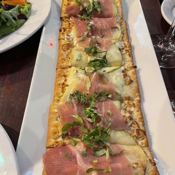 The Cask - Green Apple and Prosciutto Flat Bread Fig spread, brie cheese, fresh basil - Wine Bars Near Me - San Carlos, California The Cask - Green Apple and Prosciutto Flat Bread Fig spread, brie cheese, fresh basil - Wine Bars Near Me - San Carlos, California