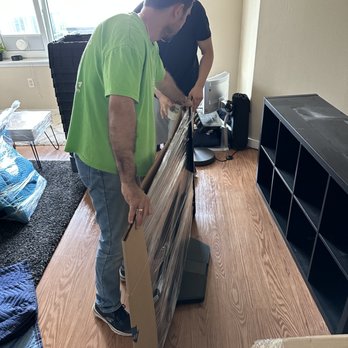 Pure Movers - Making sure the flat screen is protected - Movers Near Me - Seattle, Washington