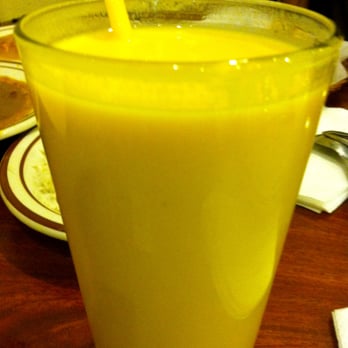 Naan N Masala - Mango Lassi (yogurty drink) closeup. - Indian Near Me - Milpitas, California Naan N Masala - Mango Lassi (yogurty drink) closeup. - Indian Near Me - Milpitas, California