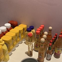 THE LOOP RESTAURANT - Extra condiments neatly laid out and clean for customers.