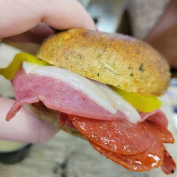 Fruits of Labor - a person holding a sandwich - Cafes Near Me - Montgomery, West Virginia Fruits of Labor - a person holding a sandwich - Cafes Near Me - Montgomery, West Virginia