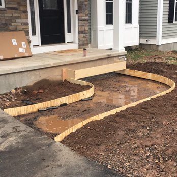 JC Construction - the front of a house being built - General Contractors Near Me