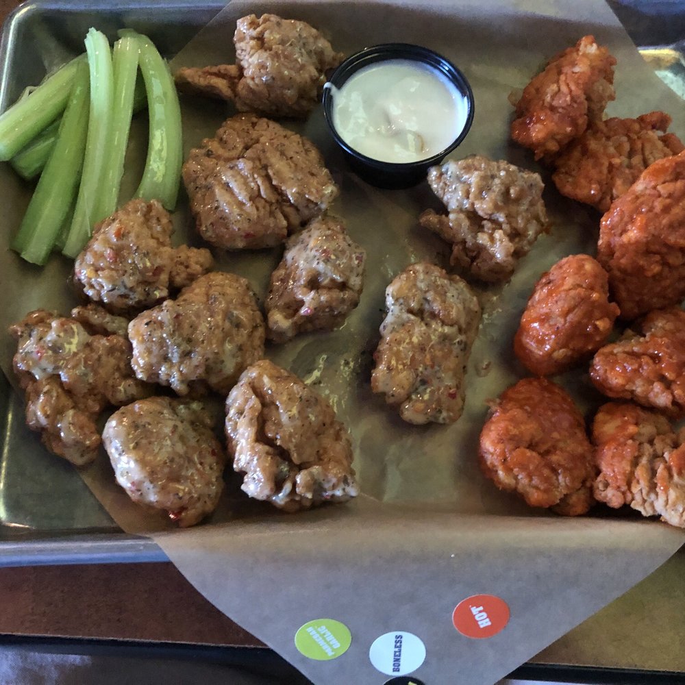 Buffalo Wild Wings - Boneless wings with garlic Parmesan and hot buffalo sauces. (Medium order, 18 wings) - American Near Me - Rehoboth Beach, Delaware Buffalo Wild Wings - Boneless wings with garlic Parmesan and hot buffalo sauces. (Medium order, 18 wings) - American Near Me - Rehoboth Beach, Delaware