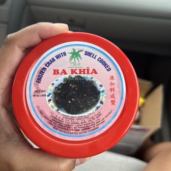 Hong Fa Market - a person holding a jar of bak ha - International Grocery Near Me - Honolulu, Hawaii