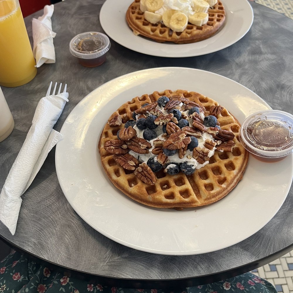 New Braunfels Coffee - Belgian Waffle. You can order various toppings like bananas, blueberries, pecans, etc. - Coffee & Tea Near Me - New Braunfells, Texas New Braunfels Coffee - Belgian Waffle. You can order various toppings like bananas, blueberries, pecans, etc. - Coffee & Tea Near Me - New Braunfells, Texas