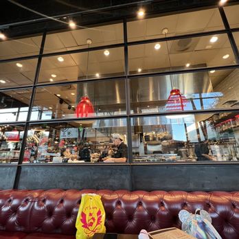 Culinary Dropout - Kitchen overlooking the dining area. - New American Near Me - Austin, Texas