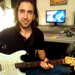 Guitar Lessons by Neil Rambaldi - Neil in his professional recording studio where he teaches his guitar lessons for both in-person students and students via online.