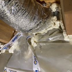 Radon Gone - Plastic not adequately closed up. Tape not sealed down.