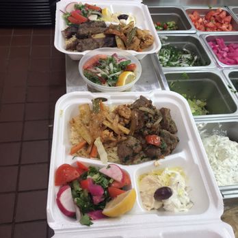 Falafel Mom - a variety of food in trays - Mediterranean Near Me - Danvers, Massachusetts Falafel Mom - a variety of food in trays - Mediterranean Near Me - Danvers, Massachusetts