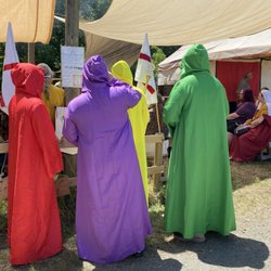 Virginia Renaissance Faire - Spectators watching cooking demonstration. May, 2025.