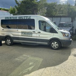 Courtesy Car & Jeep Rental - Shuttle bus