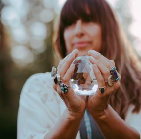 Three Feathers Holistic Logo