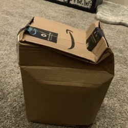 US Post Office - Package shoved in mail box
