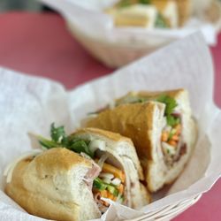 Banh Mi K - Classic Banh Mí (front), Grilled Pork Banh Mí (back)