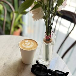cafe botanico - The barista's skills are *chef's kiss*  This place is lovely and full of life  Highly recommended